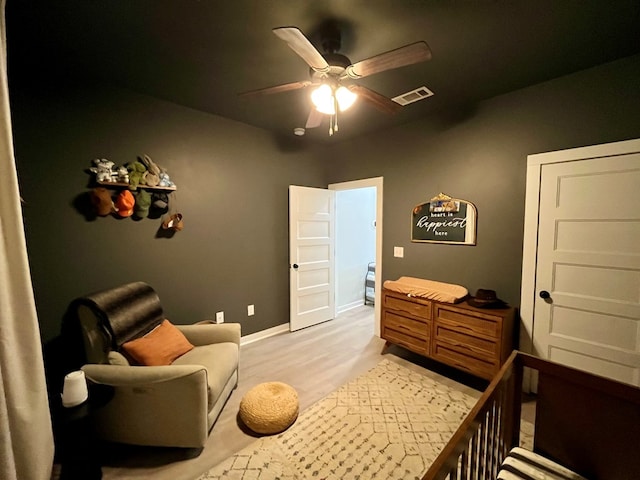 212 Neenan Dr, Enterprise, AL 36330 - bedroom featuring light wood-style flooring, ceiling fan, and baseboards