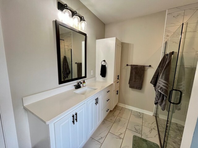 212 Neenan Dr, Enterprise, AL 36330 - bathroom featuring marble finish floors, a shower stall, vanity, and baseboards