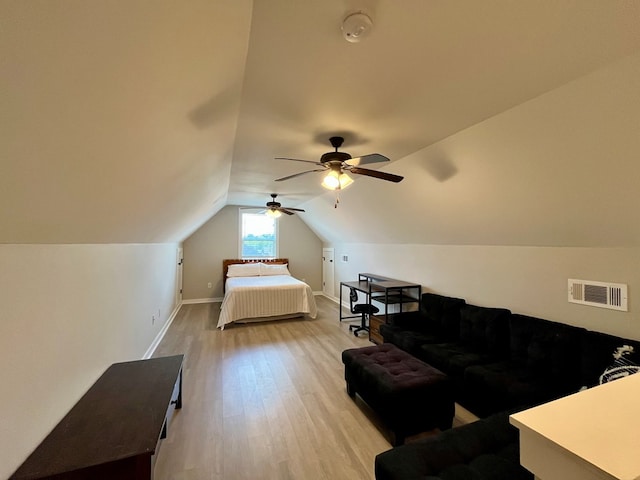 212 Neenan Dr, Enterprise, AL 36330 - bedroom with light wood finished floors, lofted ceiling, baseboards, and ceiling fan