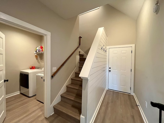 212 Neenan Dr, Enterprise, AL 36330 - stairs featuring separate washer and dryer, wood finished floors, baseboards, and vaulted ceiling