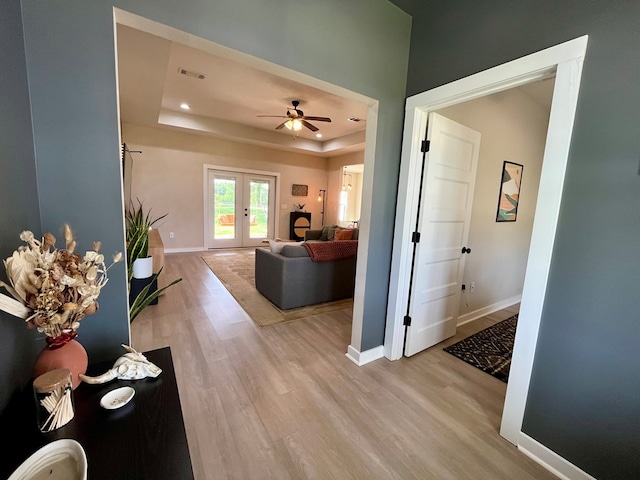 212 Neenan Dr, Enterprise, AL 36330 - living area with light wood-style flooring, a tray ceiling, baseboards, french doors, and recessed lighting