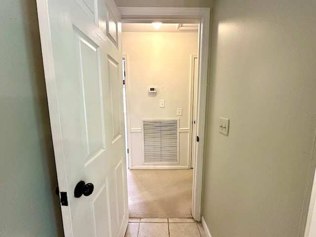 1317 Cambridge Rd, Dothan, AL 36305 - corridor with light tile patterned flooring, light carpet, and baseboards