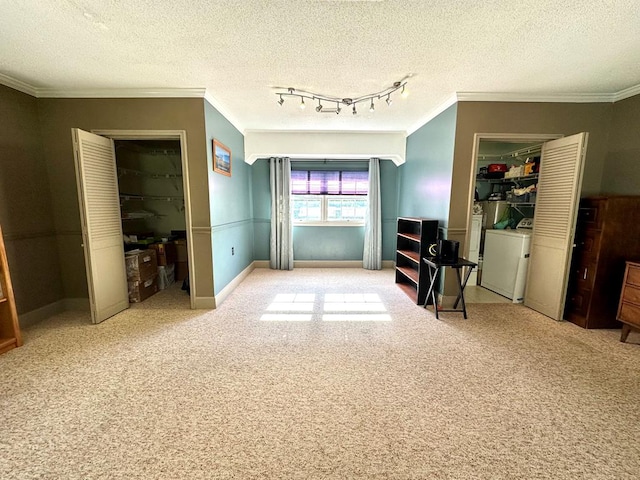 1317 Cambridge Rd, Dothan, AL 36305 - unfurnished room featuring washing machine and dryer, ornamental molding, carpet floors, and a textured ceiling