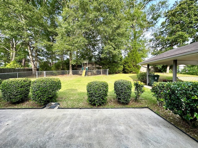 1317 Cambridge Rd, Dothan, AL 36305 - view of yard featuring a playground and a patio area