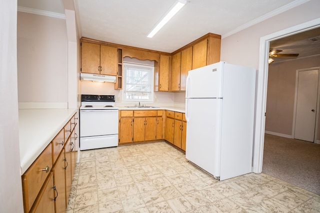 kitchen with white appliances, light floors, light countertops, under cabinet range hood, and a sink