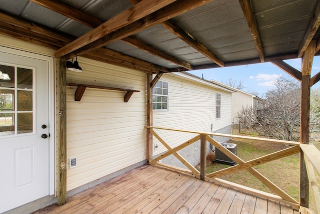 wooden deck with central AC unit