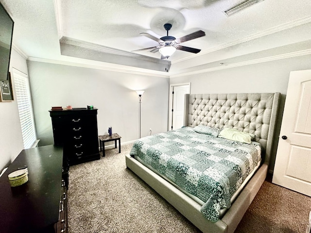 125 Sandpiper Ln, Dothan, AL 36301 - carpeted bedroom featuring a tray ceiling, ornamental molding, ceiling fan, and a textured ceiling