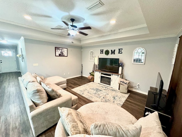 125 Sandpiper Ln, Dothan, AL 36301 - living area with a raised ceiling, crown molding, ceiling fan, dark wood-style floors, and a textured ceiling