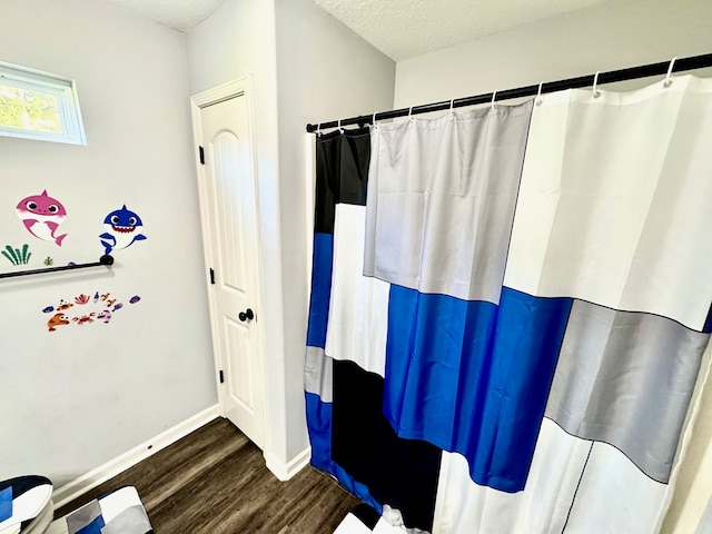 125 Sandpiper Ln, Dothan, AL 36301 - bathroom with wood finished floors and curtained shower