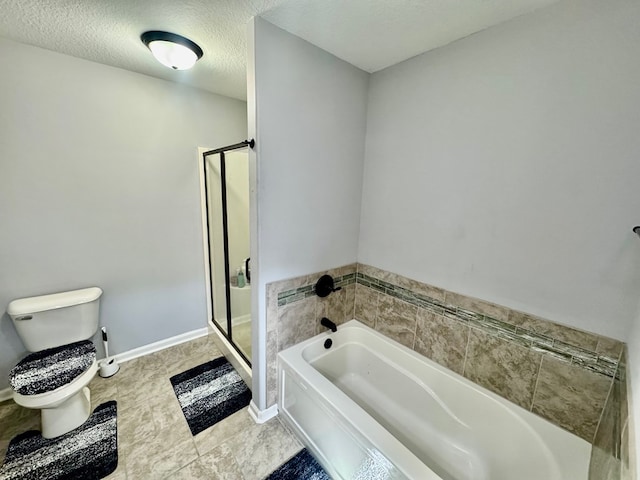 125 Sandpiper Ln, Dothan, AL 36301 - full bathroom with a garden tub, a stall shower, and a textured ceiling