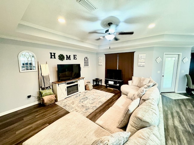 125 Sandpiper Ln, Dothan, AL 36301 - living area with a tray ceiling, dark wood-style flooring, ceiling fan, crown molding, and recessed lighting
