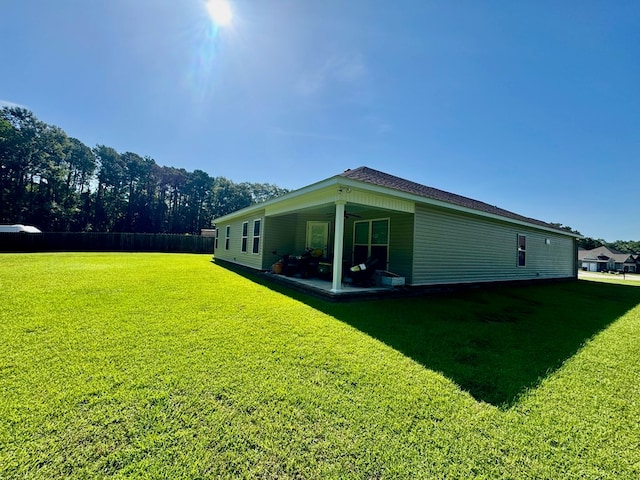 125 Sandpiper Ln, Dothan, AL 36301 - rear view of house with a patio, ceiling fan, and a shingled roof