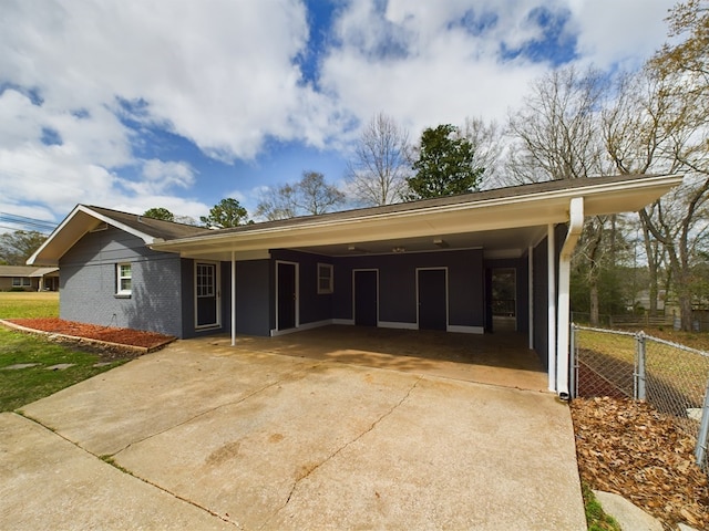 ranch-style house with a carport