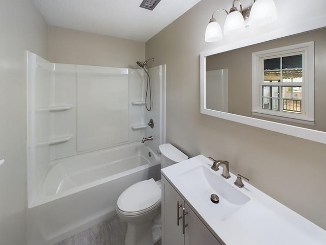 full bathroom featuring vanity, toilet, and shower / bath combination