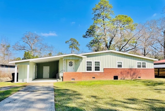 view of front facade featuring board and batten siding, an attached carport, crawl space, and concrete driveway