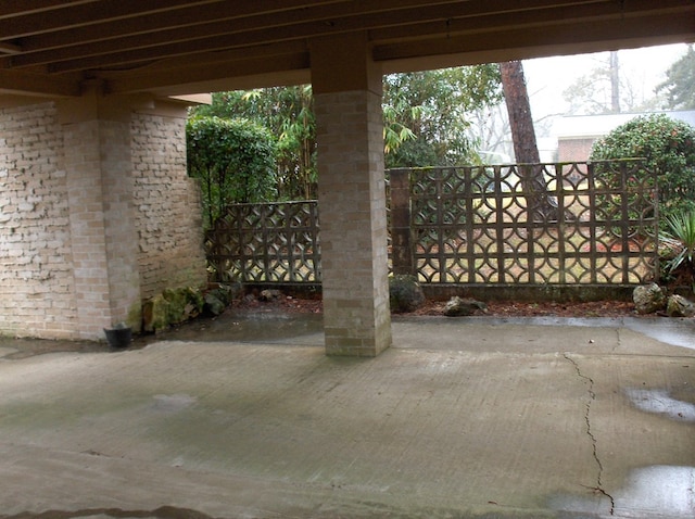 view of patio / terrace featuring fence