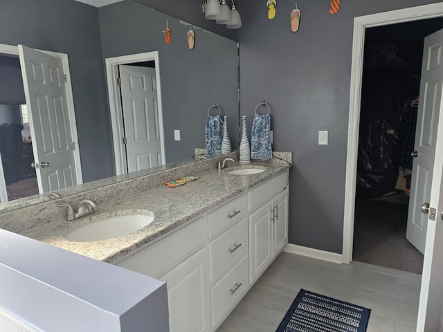 bathroom featuring vanity and tile patterned floors