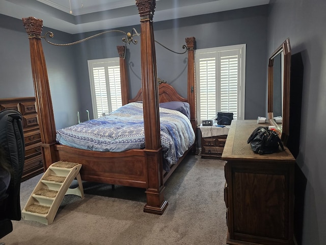 bedroom featuring carpet flooring and crown molding