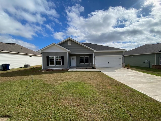 139 Faulk Rd, Dothan, AL 36301 - ranch-style home featuring driveway, board and batten siding, a garage, a front yard, and covered porch