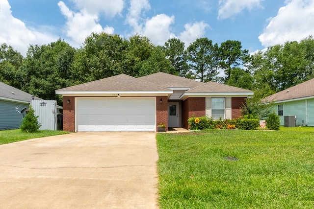 330 Brushfire Dr, Dothan, AL 36305 - view of front of home featuring brick siding, an attached garage, concrete driveway, and a front yard