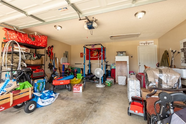 330 Brushfire Dr, Dothan, AL 36305 - garage featuring a garage door opener and electric panel