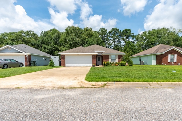 330 Brushfire Dr, Dothan, AL 36305 - single story home featuring driveway, an attached garage, a front lawn, and brick siding