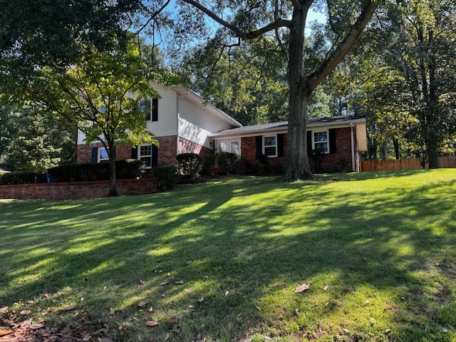 exterior space featuring a front lawn