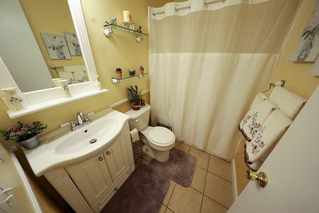 full bath featuring a shower with curtain, toilet, vanity, and tile patterned flooring