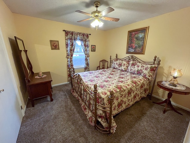 bedroom featuring ceiling fan, a textured ceiling, baseboards, and carpet floors