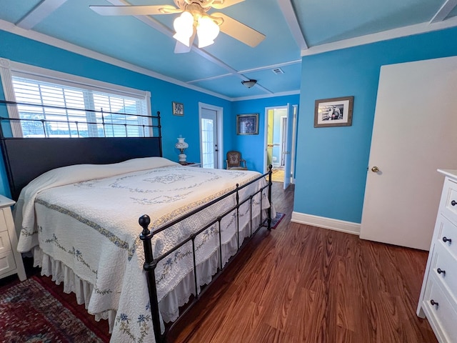 bedroom with ceiling fan, baseboards, and wood finished floors