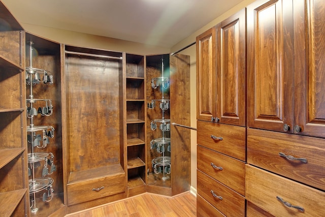 spacious closet featuring light wood-type flooring