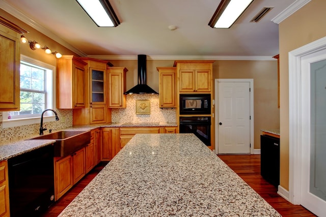 kitchen featuring sink, dark wood-type flooring, wall chimney range hood, black appliances, and ornamental molding