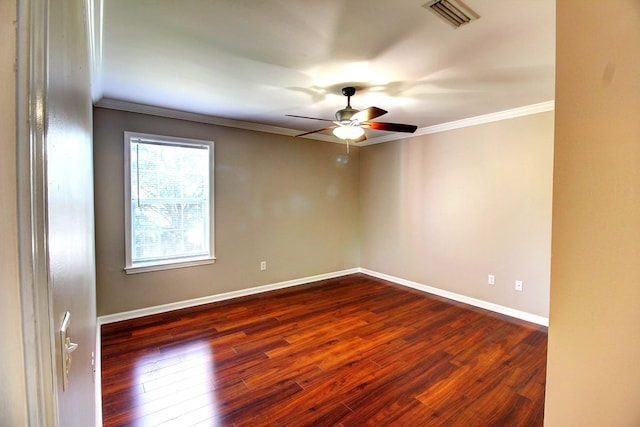 unfurnished room with ceiling fan, ornamental molding, and dark wood-type flooring