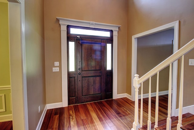 entrance foyer with dark wood-type flooring