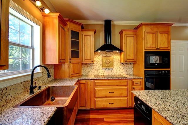 kitchen featuring ornamental molding, sink, wall chimney exhaust hood, and black appliances