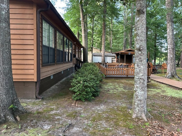 555 Cove Rd, Abbeville, AL 36310 - view of yard with a wooden deck