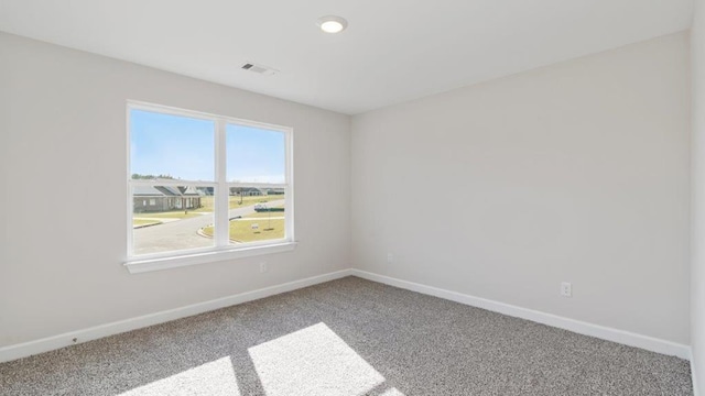 109 Creekridge St, Headland, AL 36345 - spare room with baseboards, carpet flooring, and visible vents