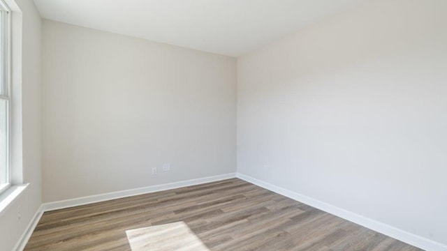 109 Creekridge St, Headland, AL 36345 - spare room featuring wood finished floors and baseboards
