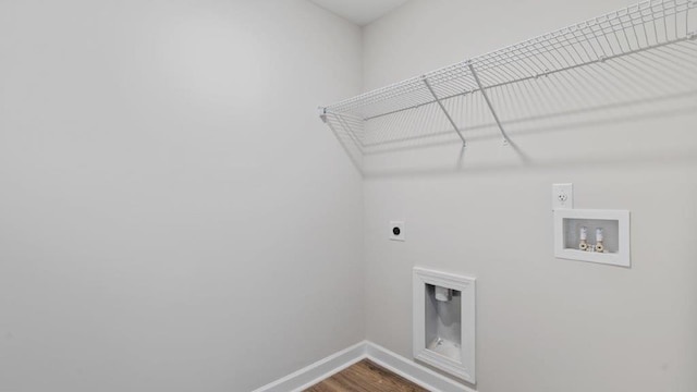 109 Creekridge St, Headland, AL 36345 - laundry area with baseboards, hookup for a washing machine, laundry area, dark wood-style floors, and electric dryer hookup
