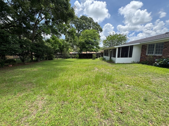 411 Kentworth Dr, Dothan, AL 36301 - view of green lawn featuring a sunroom