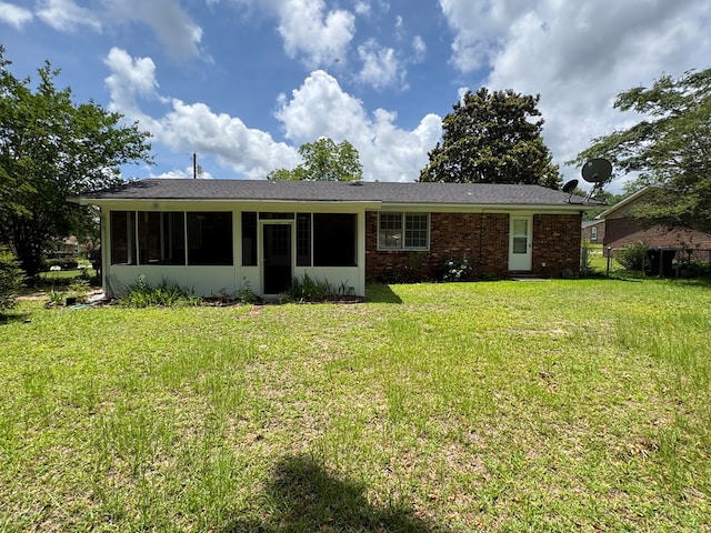 411 Kentworth Dr, Dothan, AL 36301 - back of house with a sunroom and a yard