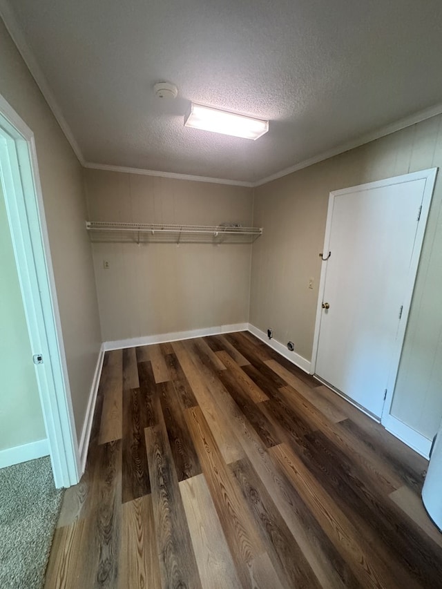 411 Kentworth Dr, Dothan, AL 36301 - laundry area with dark wood-type flooring, a textured ceiling, and ornamental molding