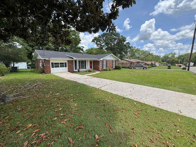 411 Kentworth Dr, Dothan, AL 36301 - ranch-style home featuring brick siding, a garage, a front lawn, and driveway