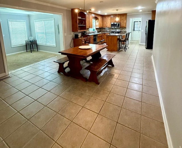 300 Mixson St, Enterprise, AL 36330 - dining area with light tile patterned flooring, ornamental molding, plenty of natural light, and recessed lighting