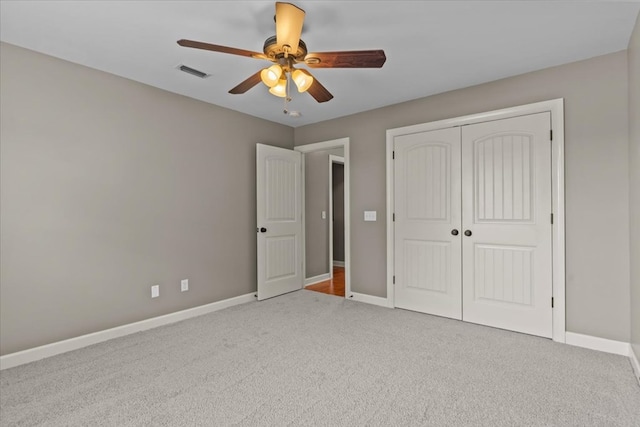 102 Tumbleweed Dr, Enterprise, AL 36330 - unfurnished bedroom featuring carpet flooring, a closet, and a ceiling fan