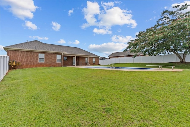 102 Tumbleweed Dr, Enterprise, AL 36330 - rear view of property with brick siding and a fenced backyard