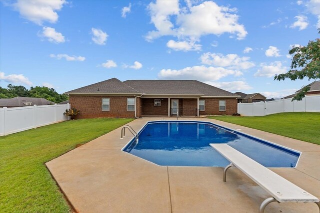 102 Tumbleweed Dr, Enterprise, AL 36330 - view of swimming pool with a patio, a fenced backyard, and a diving board