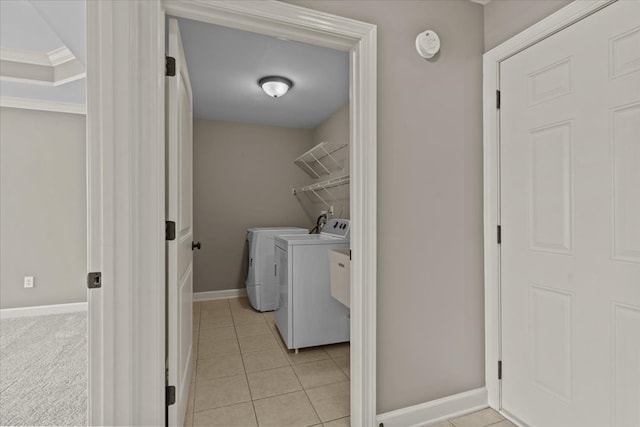 102 Tumbleweed Dr, Enterprise, AL 36330 - washroom with washer and dryer and light tile patterned flooring