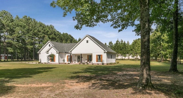 3155 Eddins Rd, Dothan, AL 36301 - modern farmhouse with a front lawn and covered porch