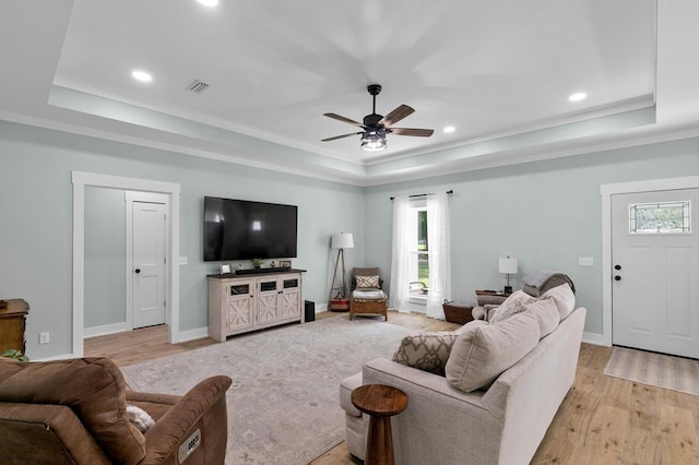 3155 Eddins Rd, Dothan, AL 36301 - living room featuring a raised ceiling, plenty of natural light, ceiling fan, light wood-type flooring, and recessed lighting